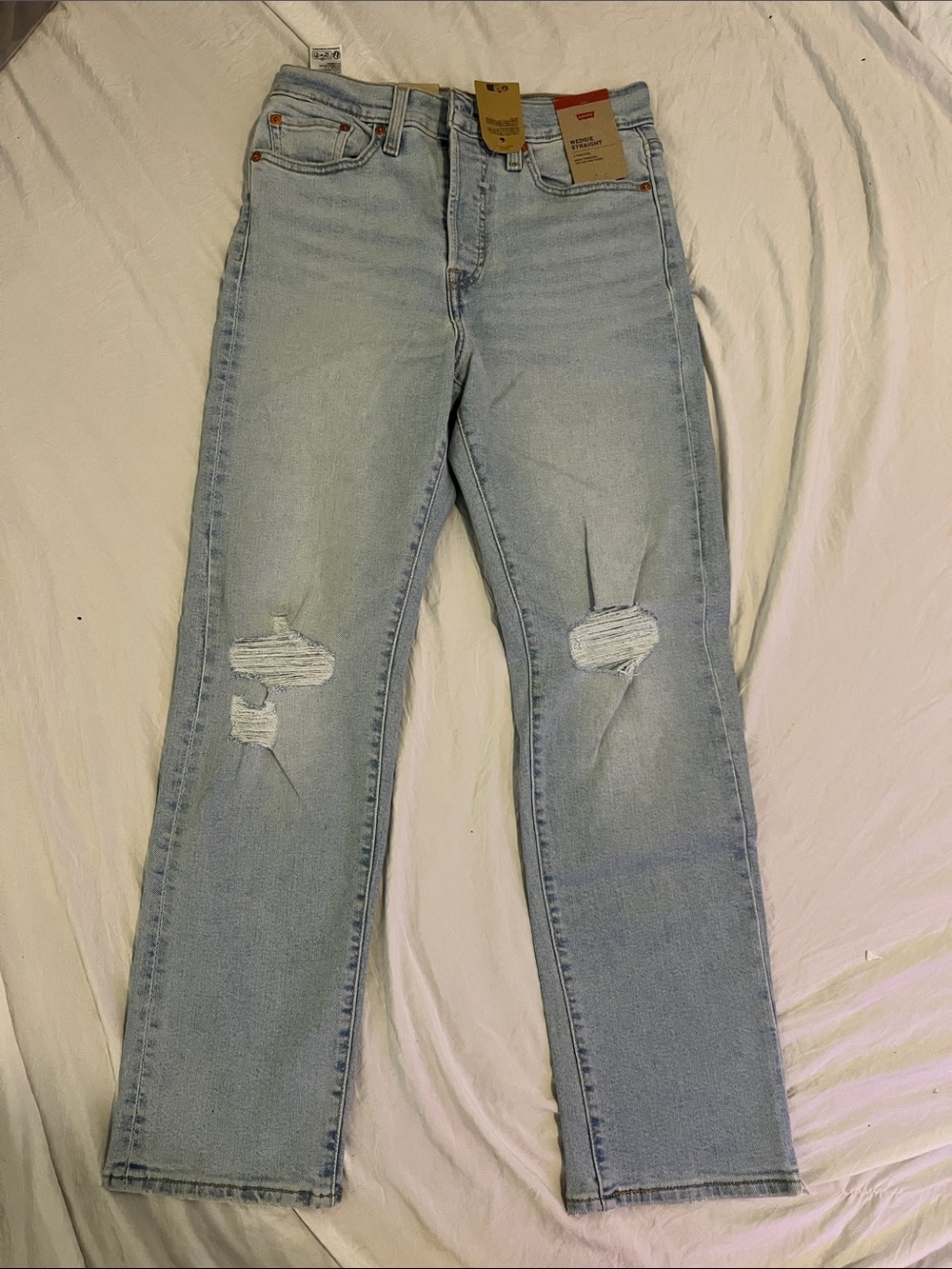 Levi's Light Blue Straight Leg Ripped Jeans